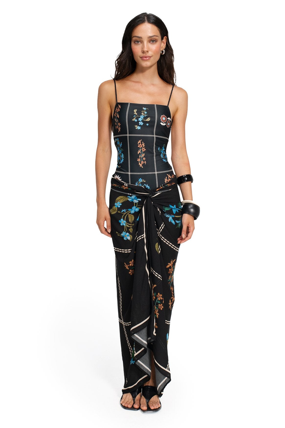 Black pareo cover-up with white contrast stitching grid and pattern detail embroidery in blue and coral tones